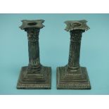 A pair of late Victorian silver 'Corinthian Column' Candlesticks, by William Hutton & Sons,