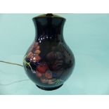 A Moorcroft pottery Magnolia pattern Table Lamp, of baluster form, with shade, overall 22½in (