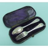 A cased Victorian silver Christening Spoon and Fork Set, by H J Lias & Son, hallmarked London, 1870,