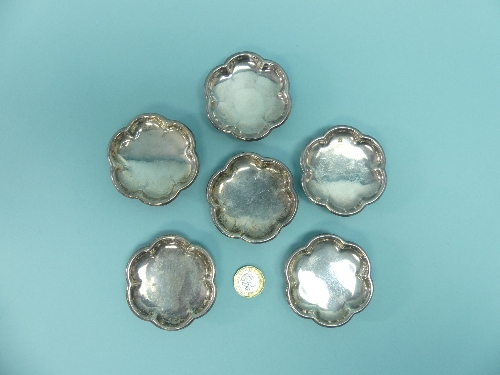 A set of six Chinese silver lobed Dishes, possibly stands for tea bowls, with Chinese character