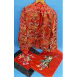 Chinese textiles: a vintage red brocade Mandarin Jacket, together with two Chinese embroidered