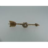A 15ct yellow gold star burst shaped Pendant / Brooch, set seed pearls, one missing, 3.5cm diameter,