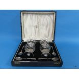 A cased set of four etched glass Sundae Glasses, with four silver spoons, hallmarked Sheffield 1927,