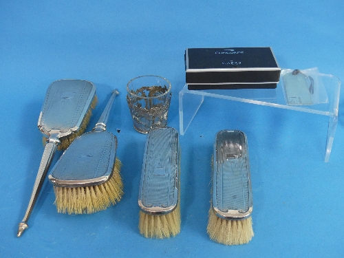 A George V silver four piece Dressing Table Set, by Walker & Hall, hallmarked Birmingham, 1932/1933,