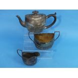 A Victorian silver three piece Tea Set, by Nathan & Hayes, hallmarked Birmingham, 1888, of ovoid