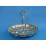 A Continental circular silver lobed Dish, raised on three cast legs, with central column handle,