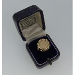 A 14ct yellow gold 'Coin Ring', the central 'coin' bearing the head of the Egyptian Queen Nefertiti,