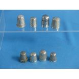 A collection of six silver Thimbles, one to commemorate the Wedding of Prince Charles to Lady