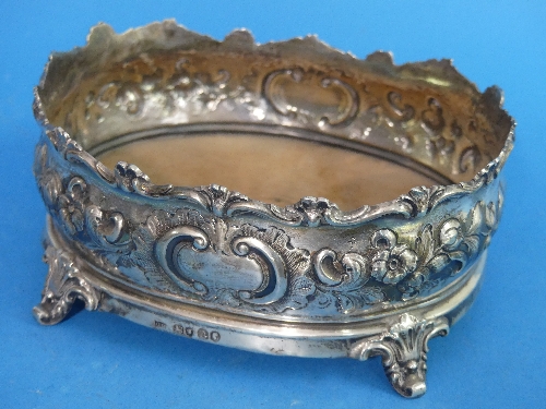 A Victorian silver Bottle Stand, by George John Richards, hallmarked London, 1851, of oval form with