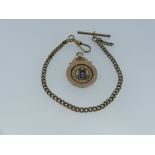A 9ct yellow and rose gold enamelled Watch Chain Fob, engraved 'Leeds 2nd League 1914', approx total