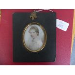 Early 19th century School, a portrait miniature of Martha Davis, oval, watercolour, in papier-