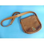 Burberrys: a vintage brown leather 'Postman' Shoulder Bag, with brass and tartan logo clasp,