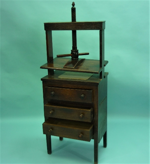 A George III oak Book Press on Chest of Drawers, the rectangular press with turned thread and - Image 2 of 2