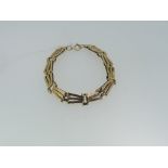 A 9ct yellow gold gatelink Bracelet, with bolt ring clasp, approx total weight 9.2g.