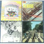 Vinyl Records; A collection of fifteen Beatles LP's and Compilations, including eight yellow & black