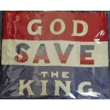 An early 20thC 'God Save the King' cloth Flag, in red, white and blue, 35in (89cm) wide.