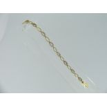 A narrow 18ct gold Bracelet, alternatively set with open rectangular gold links and open links set