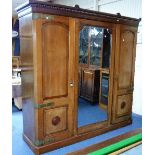 A Victorian aesthetic style large Compactum Wardrobe by John Taylor and Son of Edinburgh, with