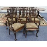 A set of eight George III style mahogany Dining Chairs, including two carvers, each with a carved