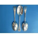 A set of three Edwardian silver 'Picture back' Table Spoons, by Thomas Bradbury & Sons, two