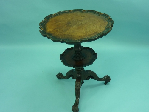 A late Victorian walnut piecrust Table, the shaped circular top on a baluster turned column with