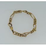 A 15ct rose gold Bracelet, with longer open twisted links interspersed with three curb links, all