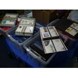 Stamps; A large collection of mainly commemorative covers, in four plastic crates with Great Britain