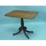 A Georgian mahogany pedestal Table, the rectangular top with moulded edge and rounded angles, on a