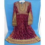 Vintage textiles: an early 20thC Ottoman dark red silk & cut velvet smock Dress with elaborate