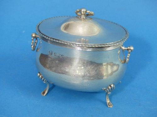 An Edwardian silver Tea Caddy, by William Hutton & Sons Ltd. hallmarked Sheffield 1908, of oval form