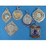 Football Interest; A collection of six early 20thC silver Fobs, including one with gilded front