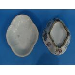 A pair of Chinese porcelain famille rose Dishes, of shaped oval form decorated with figures and