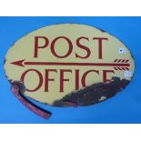 A mid 20thC enamel double sided Post Office oval direction Sign, red lettering on cream ground, poor