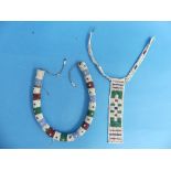 A collection of vintage Zulu beadwork, including a tubular necklace with striped design (48cm),