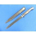 A German W.W.1 period 1920 Bayonet, and scabbard, the 9?in (25cm) blade signed Gottlieb Hammesfahr