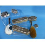 An Edwardian silver and tortoiseshell mounted five piece Dressing Table Set, by William Comyns &