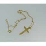 A 9ct yellow gold Cross Pendant, with textured front, on a 9ct gold trace chain, approx total weight