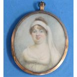 Early 19th century School, a miniature portrait of a young woman wearing a head scarf, oval,