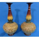 A pair of Royal Doulton 'Slater's Patent' stoneware Vases, of globular form with tall slender necks,