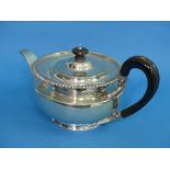 A George V silver Teapot, by Goldsmiths & Silversmiths Co Ltd., hallmarked London, 1919, of plain