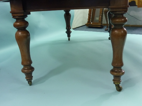 A Victorian mahogany D-end extending Dining Table, with one leaf, on ring turned bulbous legs with - Image 2 of 2