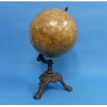 An early 20thC Globe, raised on a cast iron stand, retailed by G. Pirks and Son, 10 Old Town