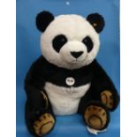 Steiff; 'Pummy Panda', 075803, black/white, 70cm, complete with label, gold button and yellow ear