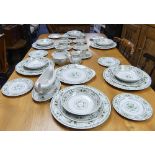 A Royal Doulton 'Provencal' pattern six place setting Dinner and Tea Service, the green floral and