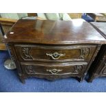 A pair of American, Louis XVI-style, reproduction walnut Chest of Drawers, in a serpentine manor,