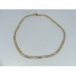 An 18ct Tri-Colour gold Necklace, formed of woven flattened chains of white, yellow and rose gold,