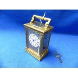 An early 20th century gilt brass five-glass Carriage Clock, 1¾in (4.5cm) circular enamel dial