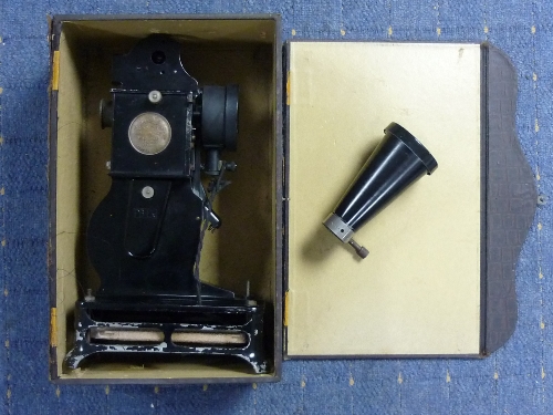 An early 20thC French 'Baby Projector', in original box, together with a quantity of baby film - Image 3 of 8