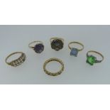 A collection of six 9ct gold Ring, variously set with paste, synthetic sapphire, smokey quartz, seed