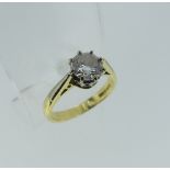 A diamond solitaire Ring, the brilliant cut stone approx. 1ct, mounted in yellow and white gold